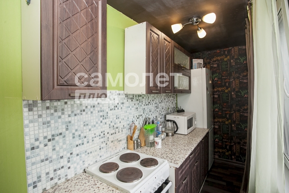 
   Продам 1-комнатную, 30.3 м², Строителей б-р, 56/2

. Фото 10.