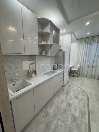 
  Продается студия 27 м², в ЖК Радужный каскад, б/с 19. Фото 1.