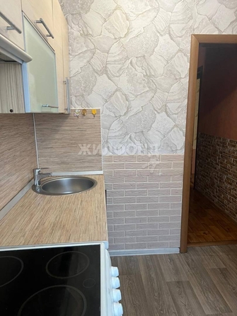 
   Продам 1-комнатную, 30.6 м², Зорге ул, 259

. Фото 10.